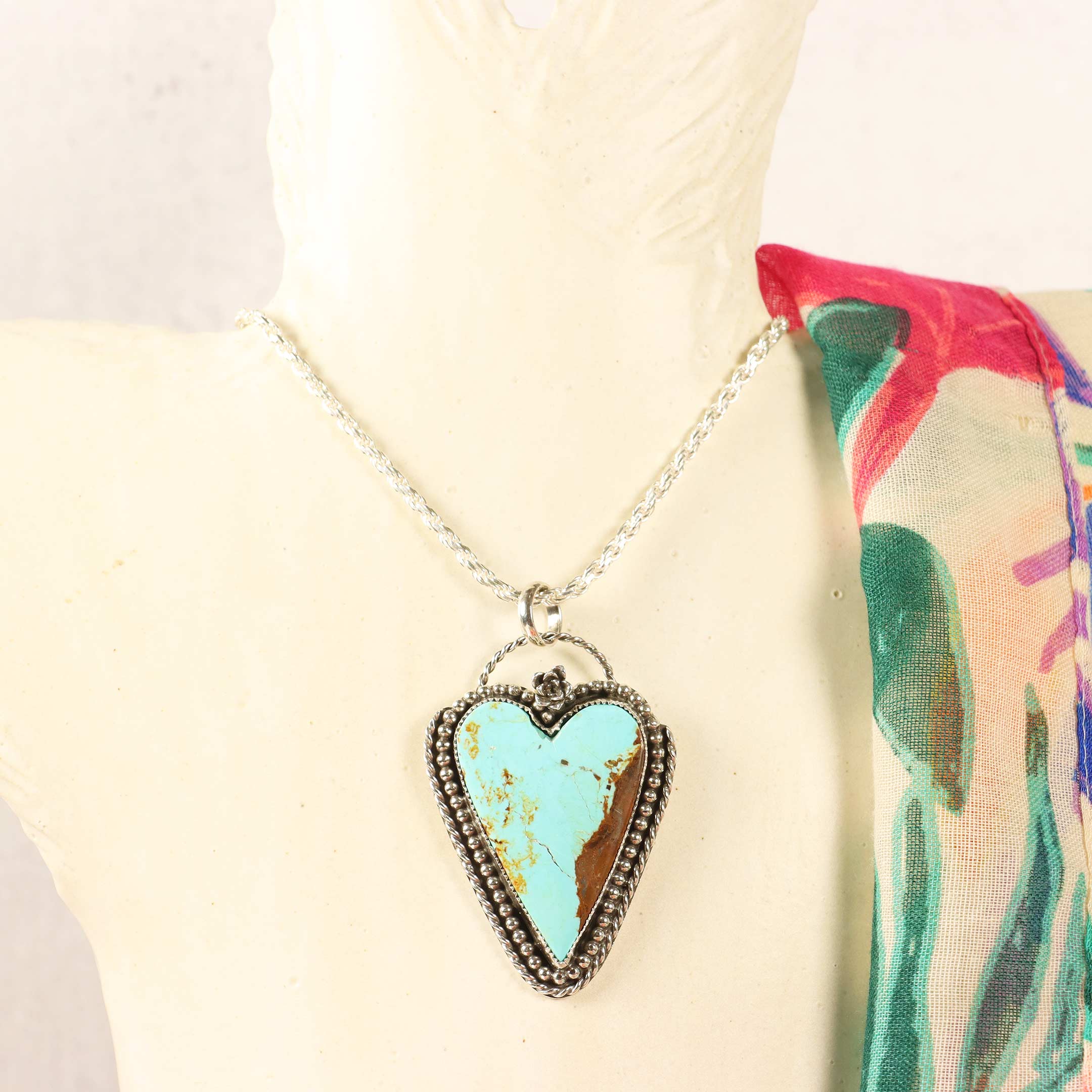 Necklace with a heart-shaped turquoise pendant