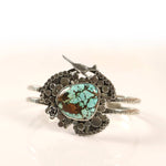 Silver bracelet with a turquoise stone