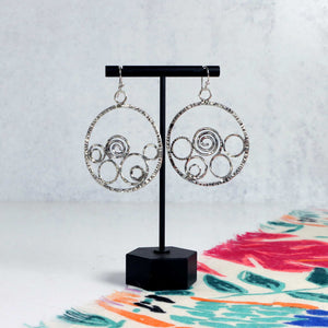 Stamped swirl hoop earrings